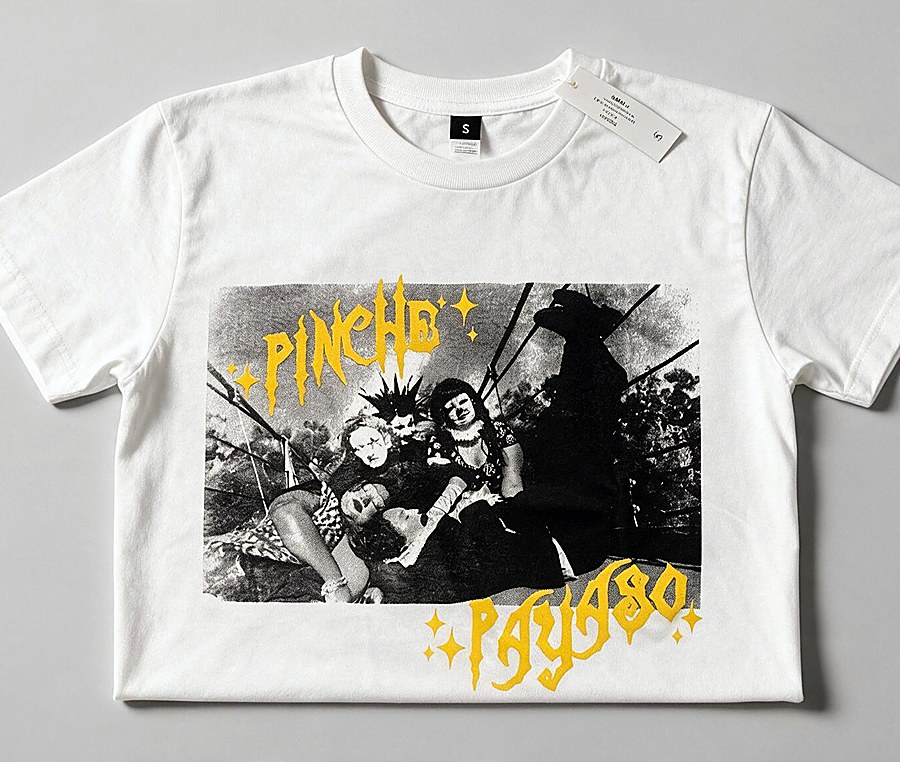 White tee printed with a black and white halftone photograph and yellow lettering